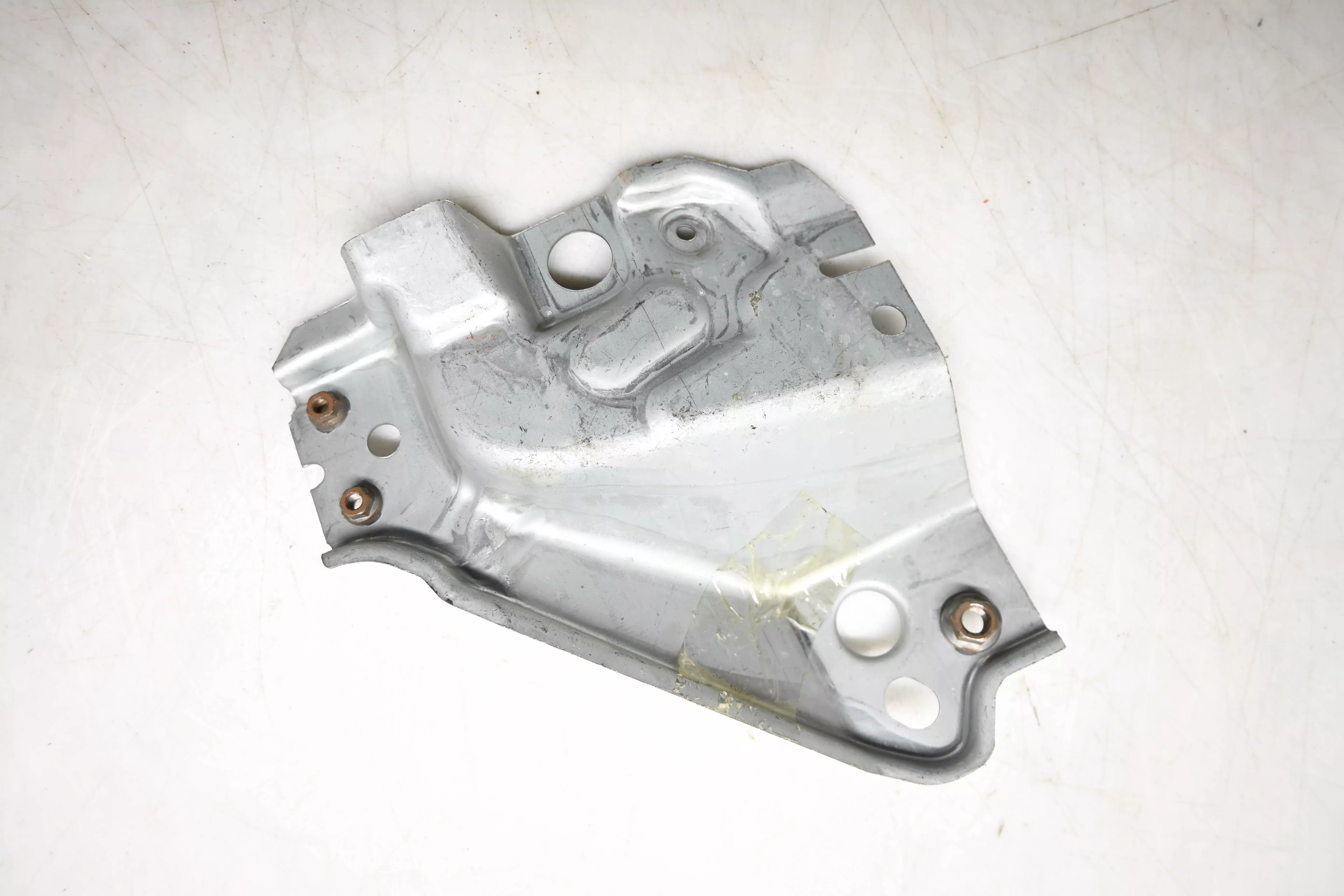 New OEM Ford YL8Z-13A114-AB Passenger Headlight Bracket NOS